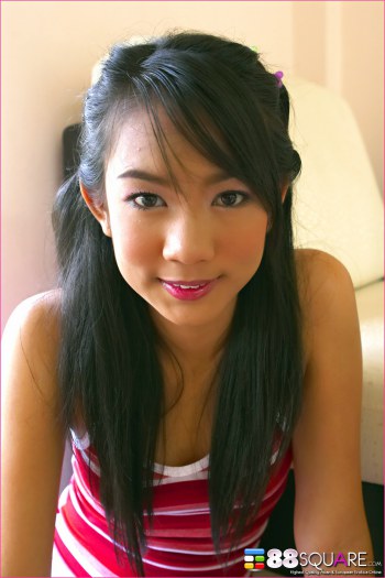 Beautiful Thai girl exposed pussy masturbation nude photo